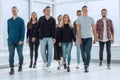 group of diverse young people walking in a new office Royalty Free Stock Photo