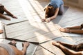 Group of young people practicing yoga lesson, doing Child exercise Royalty Free Stock Photo