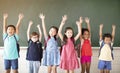 Diverse young students standing together in classroom Royalty Free Stock Photo