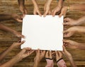 Group of diversity hands holding empty paper Royalty Free Stock Photo