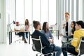 Group of Diversity People Team smiling, laughing and cheerful in small meeting at modern office. Royalty Free Stock Photo