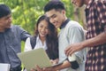 Group of Diversity Student working on laptop together at university,Happy multi ethnic friend successfully completes the thesis