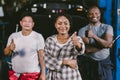 Group of diversity worker thumbs up smiling. Garage Mechanic team car auto service professional people standing together Royalty Free Stock Photo