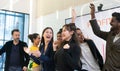 Group of diversity workers celebration for their successful. Business teamwork colleagues showing their cheerful and enjoyment