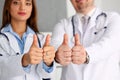 Group of doctor arms show OK or confirm sign Royalty Free Stock Photo