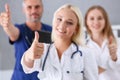 Group of doctor show OK or confirm sign with thumb up Royalty Free Stock Photo