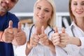 Group of doctor show OK or confirm sign with thumb up Royalty Free Stock Photo