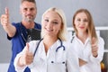 Group of doctor show OK or confirm sign with thumb up Royalty Free Stock Photo