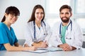 Group of doctors looking at camera and smiling Royalty Free Stock Photo