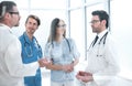 Group of doctors discussing problems in the hospital corridor Royalty Free Stock Photo