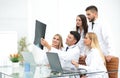 Group of doctors discussing an x-ray , sitting at the table.