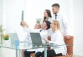 Group of doctors discussing an x-ray ,sitting at the table.