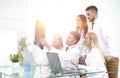 Group of doctors discussing an x-ray ,sitting at the table.