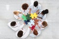 Group Of Doctors Holding Colorful Puzzle Royalty Free Stock Photo