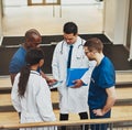 Group of doctors in an impromptu meeting Royalty Free Stock Photo