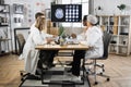 Group of doctors looking at screen with brain CT at hospital Royalty Free Stock Photo