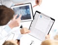 Group of doctors looking at x-ray on tablet pc Royalty Free Stock Photo