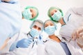 Group of doctors in operating room Royalty Free Stock Photo