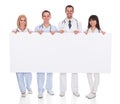 Group of doctors with placard Royalty Free Stock Photo