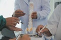 Group of doctors reading a document in meeting room at hospital Royalty Free Stock Photo