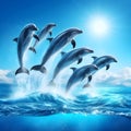 Group of dolphins jumping out of the ocean water Royalty Free Stock Photo