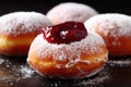 a group of doughnuts with jam on top