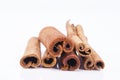 Group of dried cinnamon stics on white background Royalty Free Stock Photo