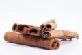 Group of dried cinnamon stics on white background Royalty Free Stock Photo