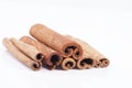 Group of dried cinnamon stics on white background Royalty Free Stock Photo