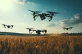 group of drones flies low over a field