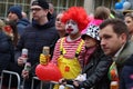 Group of Dutch citizens celebrating the Rogstaekers parade with a display of colorful costumes