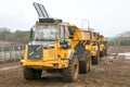 A group of earthmovers dumpers on site