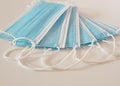 Group of Eight Blue Disposable Protective Medical Masks