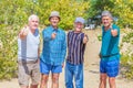 A group of elderly cheerful tourists have a great rest