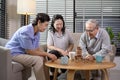 Group of elderly people enjoy talking , relaxing with game at  senior healthcare center Royalty Free Stock Photo