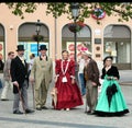 A group of elderly people of Luxembourg in antique clothes of the 19th century