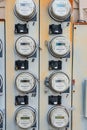 group of electric meters in an apartment building. Close-up