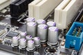 Group of electrolytic capacitors closeup on motherboard Royalty Free Stock Photo