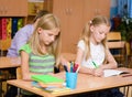 Group of elementary school pupils takes the test in class Royalty Free Stock Photo