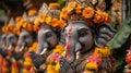 Group of Elephant Statues Adorned With Flowers