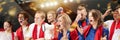 Group of emotive, expressive young people, football, soccer fans cheering France team at the stadium. Emotions of lose Royalty Free Stock Photo