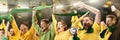 Group of emotive young people, football, soccer fans cheering Brazil team at the stadium. Successful championship Royalty Free Stock Photo