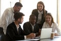 Group of employees listening to focused african american manager. Royalty Free Stock Photo