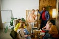 Group of employees, men and women, having meeting, lively discussion at the office, indoors. Strategy and analytics Royalty Free Stock Photo