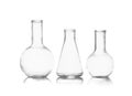 Group of empty chemistry glassware on white