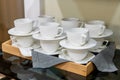 Group of empty cups, in many rows of white cup for service tea or coffee in breakfast or buffet and seminar event. Royalty Free Stock Photo