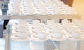 Group of empty Many rows of white ceramic coffee or tea cups and Royalty Free Stock Photo