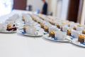 Group of empty Many rows of white ceramic coffee or tea cups Royalty Free Stock Photo