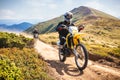 Enduro bikers crossing road in Carpathian mountains.