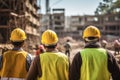 Group of engineers and architects at construction site. Selective focus, rear view of Construction workers at the construction